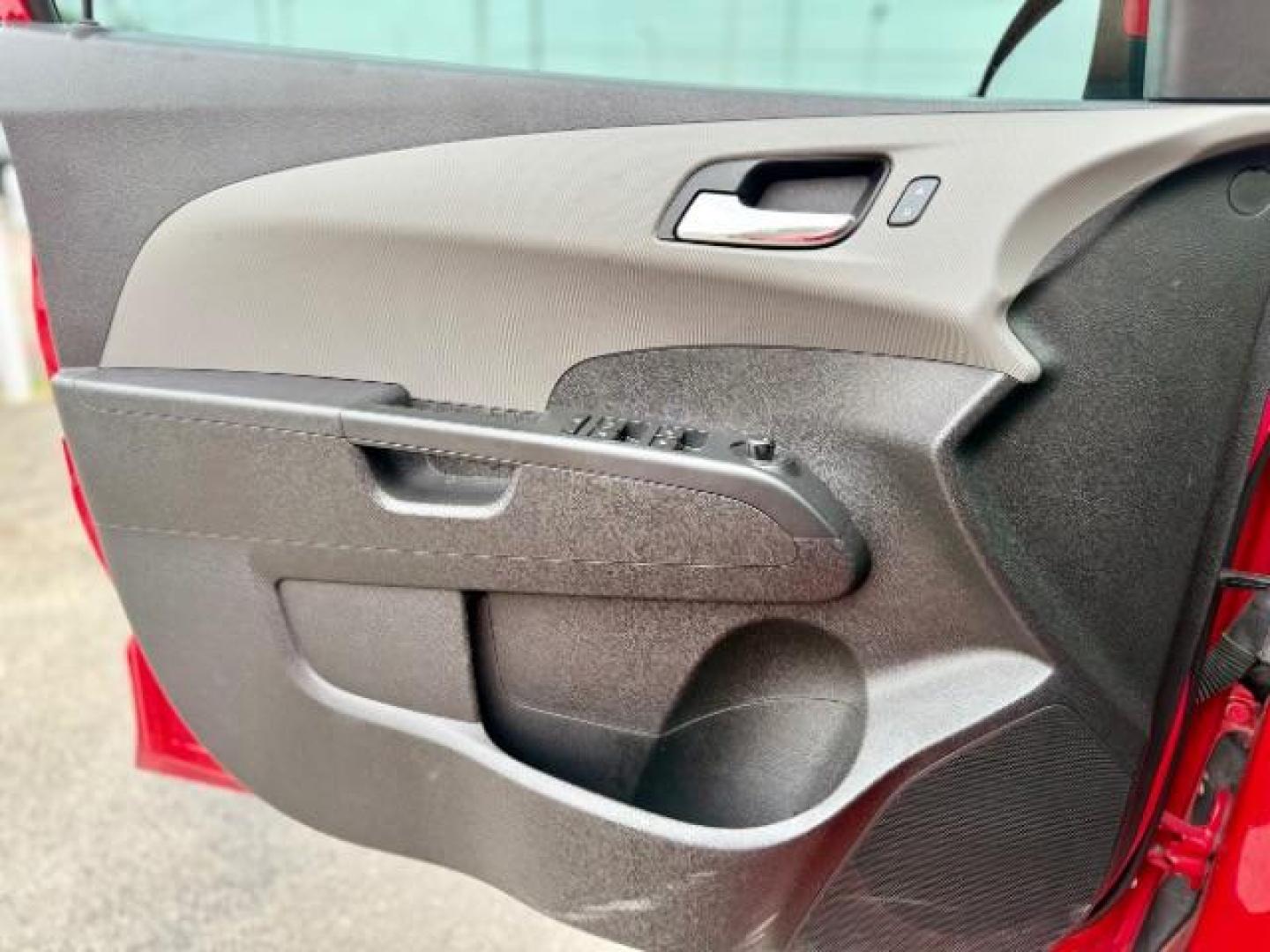 2016 RED Chevrolet Sonic LT Auto 5-Door (1G1JC6SH9G4) with an 1.8L L4 DOHC 24V engine, 6-Speed Automatic transmission, located at 4545 Spencer Hwy., Pasadena, 77504, (832) 266-1645, 29.666037, -95.173775 - Photo#10