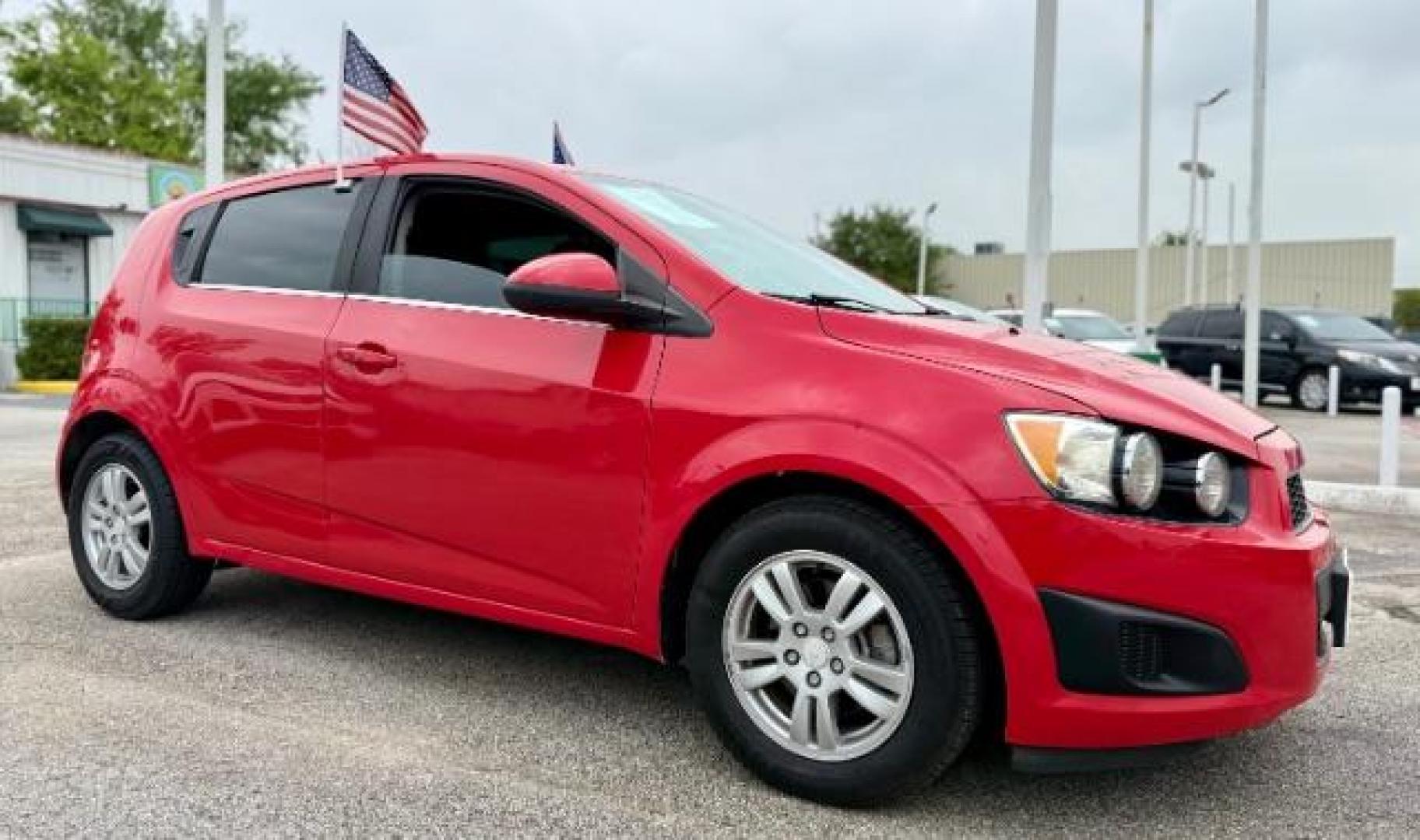 2016 RED Chevrolet Sonic LT Auto 5-Door (1G1JC6SH9G4) with an 1.8L L4 DOHC 24V engine, 6-Speed Automatic transmission, located at 4545 Spencer Hwy., Pasadena, 77504, (832) 266-1645, 29.666037, -95.173775 - Photo#3