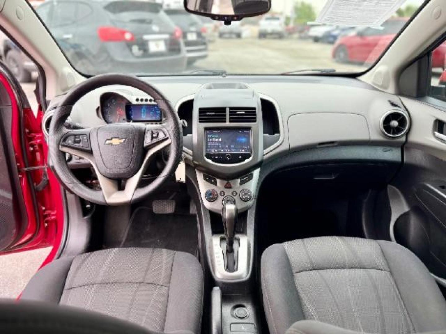 2016 RED Chevrolet Sonic LT Auto 5-Door (1G1JC6SH9G4) with an 1.8L L4 DOHC 24V engine, 6-Speed Automatic transmission, located at 4545 Spencer Hwy., Pasadena, 77504, (832) 266-1645, 29.666037, -95.173775 - Photo#6