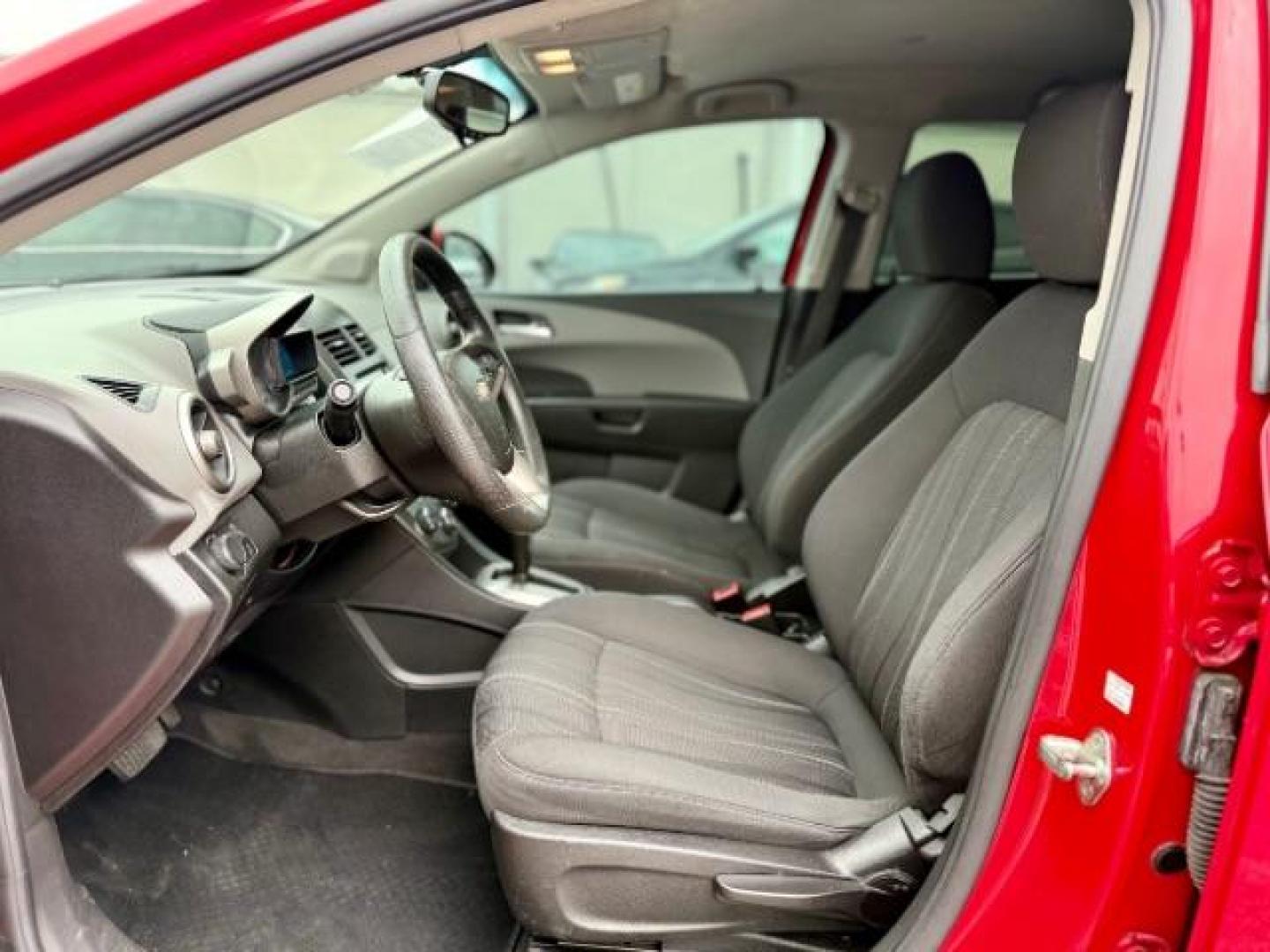 2016 RED Chevrolet Sonic LT Auto 5-Door (1G1JC6SH9G4) with an 1.8L L4 DOHC 24V engine, 6-Speed Automatic transmission, located at 4545 Spencer Hwy., Pasadena, 77504, (832) 266-1645, 29.666037, -95.173775 - Photo#7