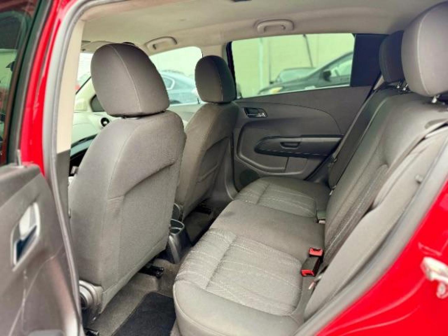 2016 RED Chevrolet Sonic LT Auto 5-Door (1G1JC6SH9G4) with an 1.8L L4 DOHC 24V engine, 6-Speed Automatic transmission, located at 4545 Spencer Hwy., Pasadena, 77504, (832) 266-1645, 29.666037, -95.173775 - Photo#8