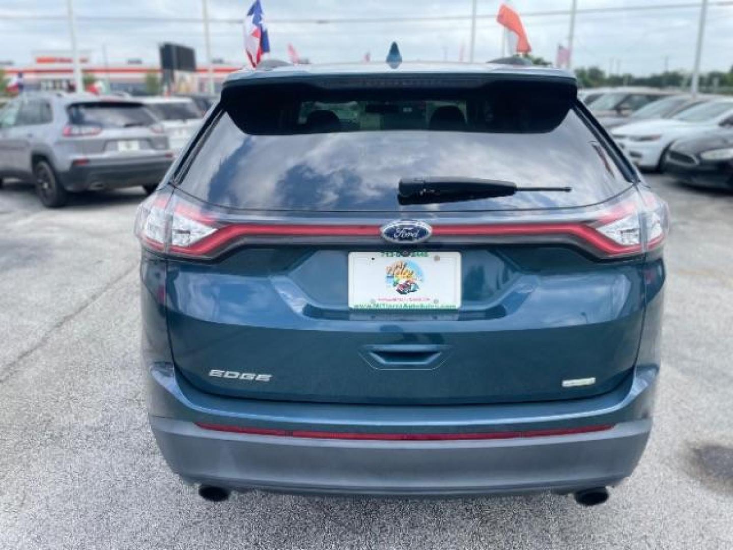 2016 Kona Blue Metallic Ford Edge SE FWD (2FMPK3G96GB) with an 2.0L L4 DOHC 16V engine, 6-Speed Automatic transmission, located at 4545 Spencer Hwy., Pasadena, 77504, (832) 266-1645, 29.666037, -95.173775 - Photo#3