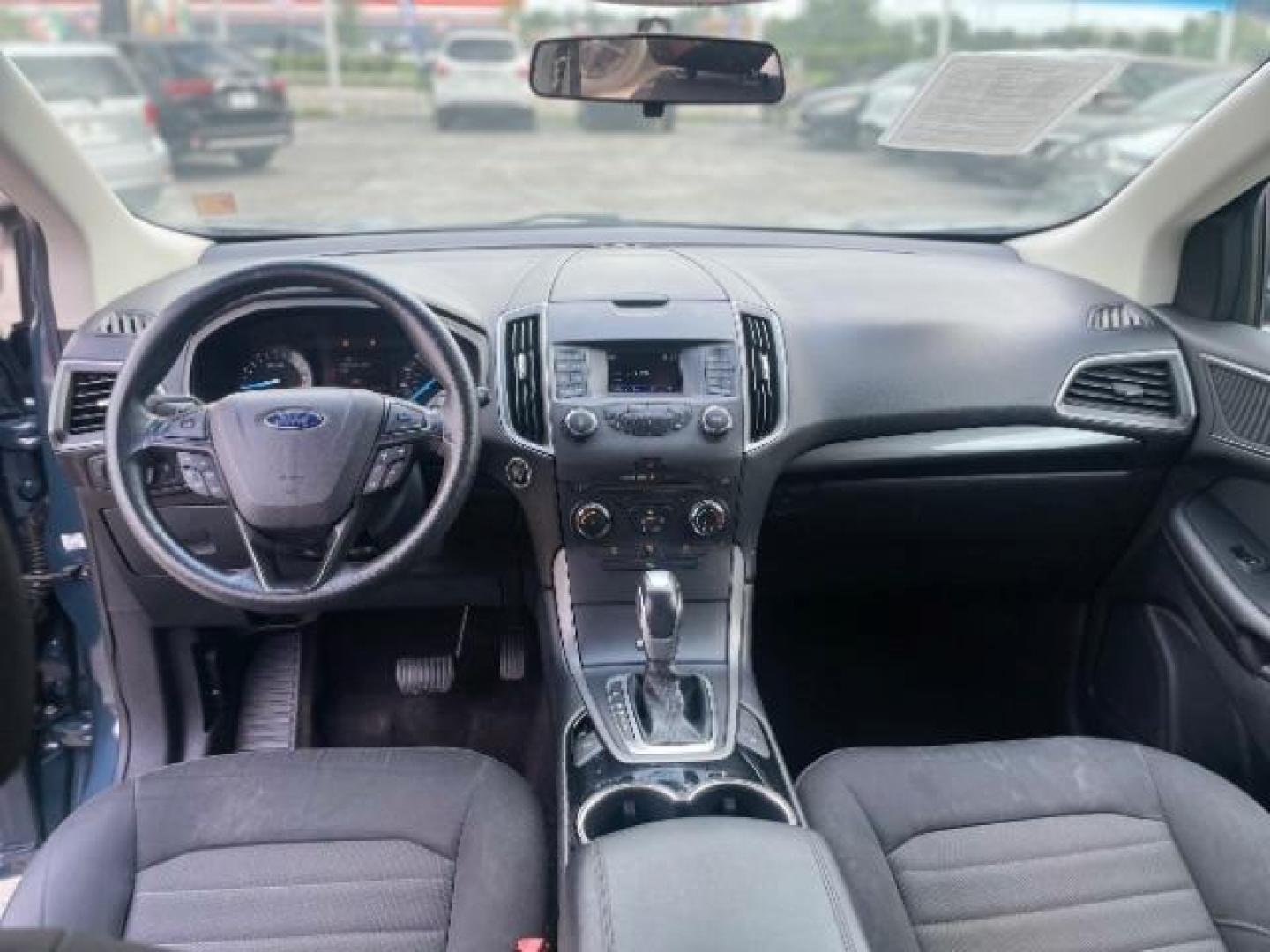 2016 Kona Blue Metallic Ford Edge SE FWD (2FMPK3G96GB) with an 2.0L L4 DOHC 16V engine, 6-Speed Automatic transmission, located at 4545 Spencer Hwy., Pasadena, 77504, (832) 266-1645, 29.666037, -95.173775 - Photo#5