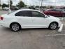 2015 Pure White /Titan Black, cloth Volkswagen Jetta SE 6A (3VWD07AJ9FM) with an 1.8L L4 DOHC 20V engine, 6-Speed Automatic transmission, located at 4545 Spencer Hwy., Pasadena, 77504, (832) 266-1645, 29.666037, -95.173775 - Photo#0