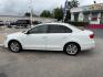 2015 Pure White /Titan Black, cloth Volkswagen Jetta SE 6A (3VWD07AJ9FM) with an 1.8L L4 DOHC 20V engine, 6-Speed Automatic transmission, located at 4545 Spencer Hwy., Pasadena, 77504, (832) 266-1645, 29.666037, -95.173775 - Photo#2
