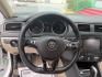 2015 Pure White /Titan Black, cloth Volkswagen Jetta SE 6A (3VWD07AJ9FM) with an 1.8L L4 DOHC 20V engine, 6-Speed Automatic transmission, located at 4545 Spencer Hwy., Pasadena, 77504, (832) 266-1645, 29.666037, -95.173775 - Photo#8