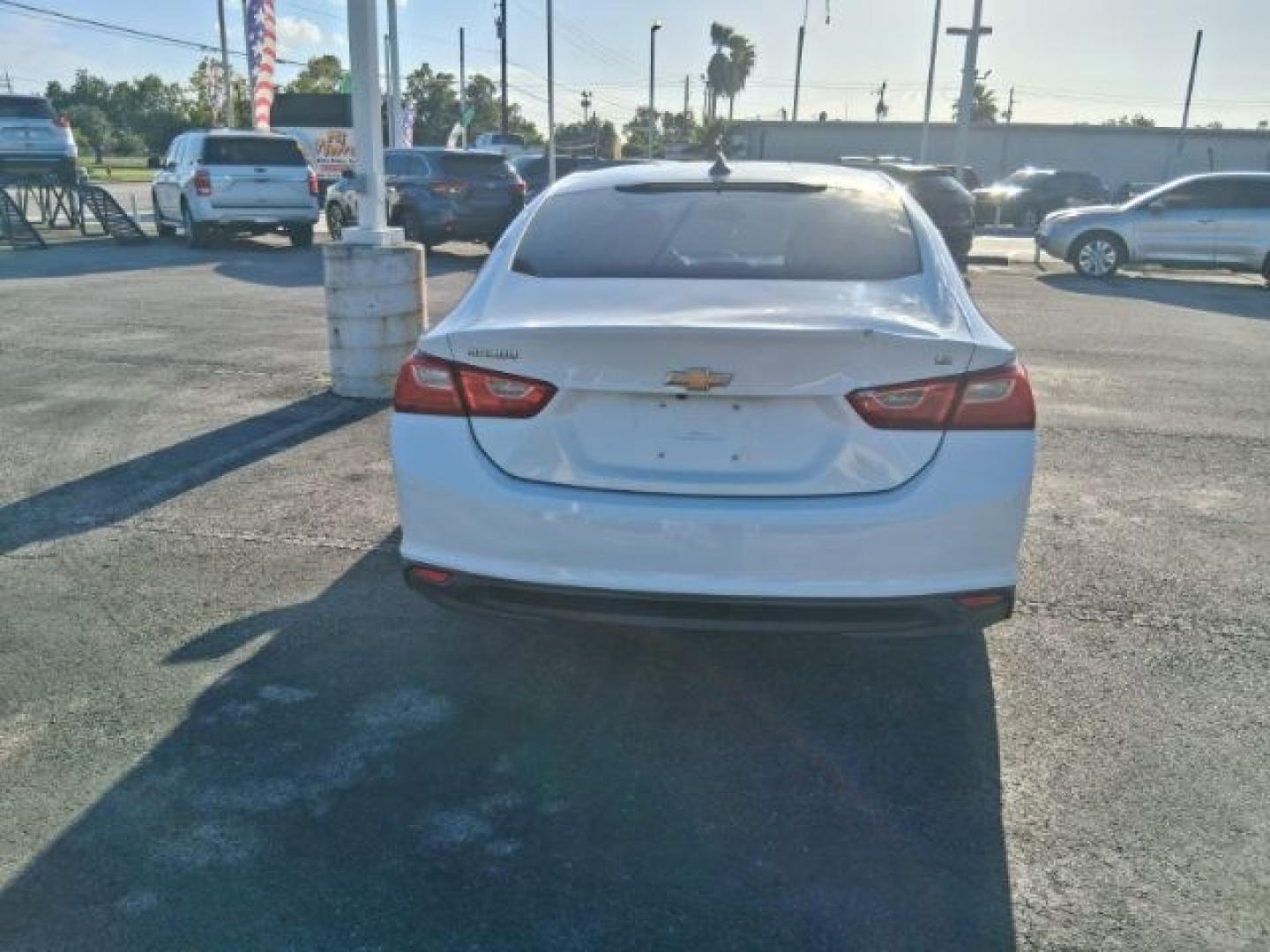 2016 Summit White Chevrolet Malibu LS (1G1ZB5ST3GF) with an 1.5L L4 DOHC 16V engine, 6-Speed Automatic transmission, located at 4545 Spencer Hwy., Pasadena, 77504, (832) 266-1645, 29.666037, -95.173775- Photo#3