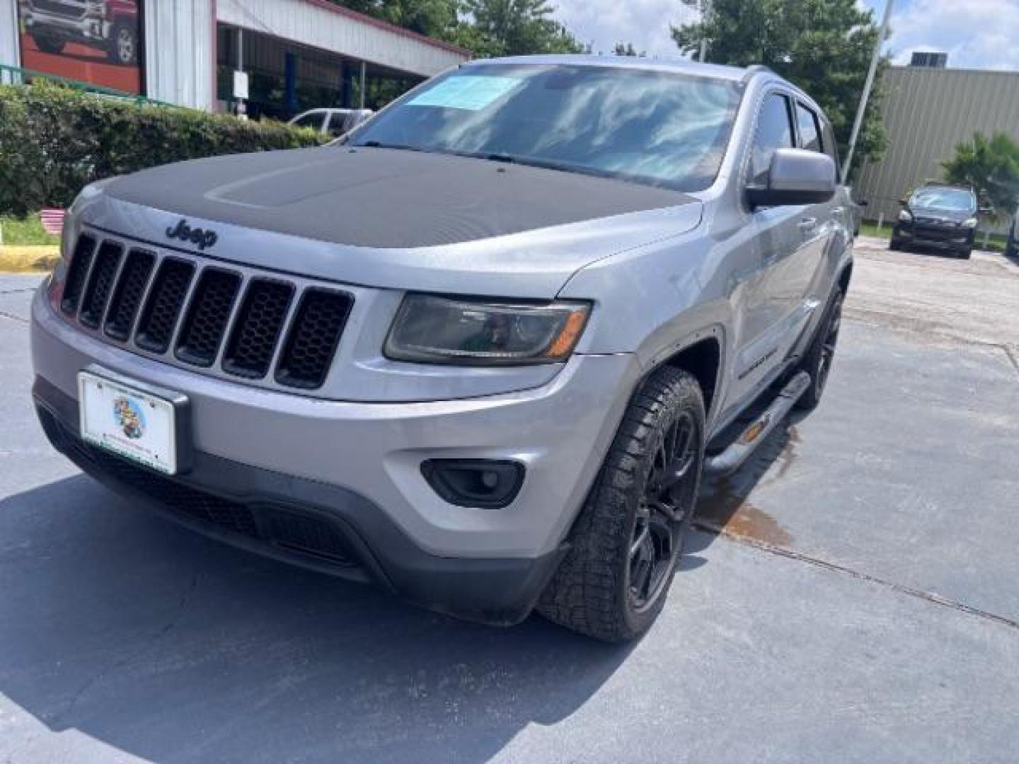 2014 Billet Silver Metallic CC /Black Jeep Grand Cherokee Laredo 2WD (1C4RJEAG0EC) with an 3.6L V6 DOHC 24V engine, 5-Speed Automatic transmission, located at 4545 Spencer Hwy., Pasadena, 77504, (832) 266-1645, 29.666037, -95.173775- Photo#2