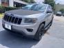 2014 Billet Silver Metallic CC /Black Jeep Grand Cherokee Laredo 2WD (1C4RJEAG0EC) with an 3.6L V6 DOHC 24V engine, 5-Speed Automatic transmission, located at 4545 Spencer Hwy., Pasadena, 77504, (832) 266-1645, 29.666037, -95.173775- Photo#2
