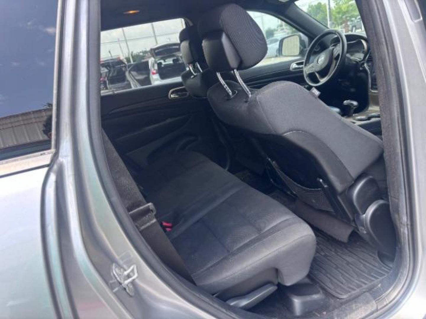 2014 Billet Silver Metallic CC /Black Jeep Grand Cherokee Laredo 2WD (1C4RJEAG0EC) with an 3.6L V6 DOHC 24V engine, 5-Speed Automatic transmission, located at 4545 Spencer Hwy., Pasadena, 77504, (832) 266-1645, 29.666037, -95.173775- Photo#9