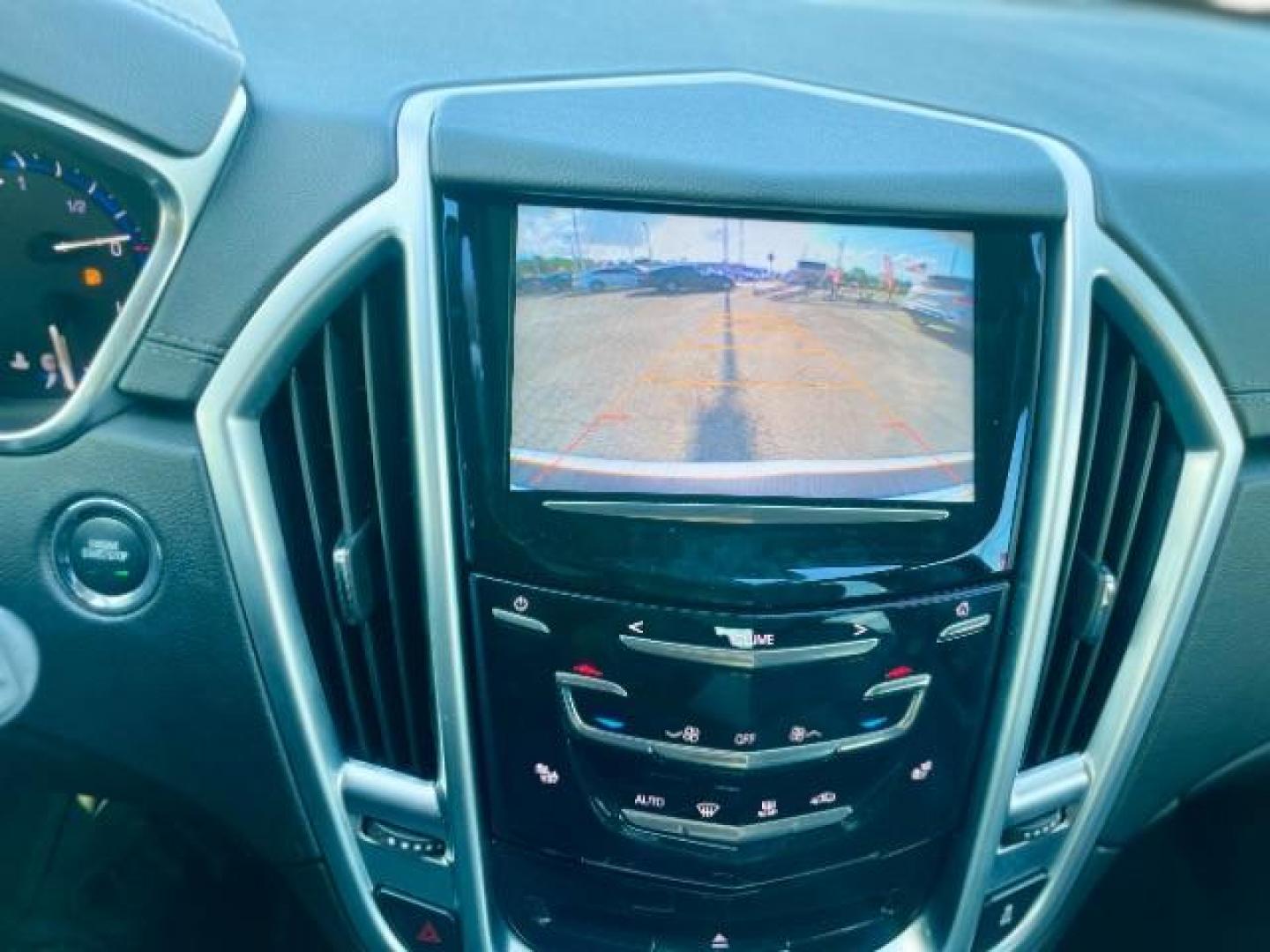 2015 Platinum Ice Tricoat /Ebony/Ebony Accents Cadillac SRX Luxury Collection FWD (3GYFNBE32FS) with an 3.6L V6 DOHC 24V FFV engine, 6-Speed Automatic transmission, located at 4545 Spencer Hwy., Pasadena, 77504, (832) 266-1645, 29.666037, -95.173775 - Photo#10