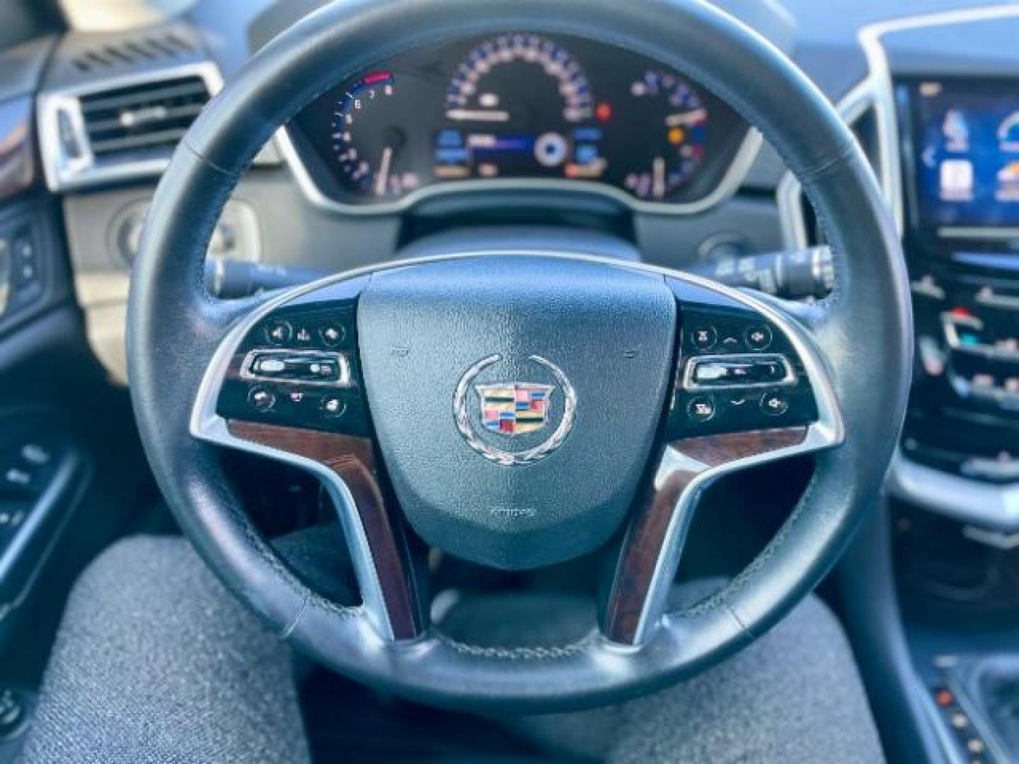 2015 Platinum Ice Tricoat /Ebony/Ebony Accents Cadillac SRX Luxury Collection FWD (3GYFNBE32FS) with an 3.6L V6 DOHC 24V FFV engine, 6-Speed Automatic transmission, located at 4545 Spencer Hwy., Pasadena, 77504, (832) 266-1645, 29.666037, -95.173775 - Photo#11