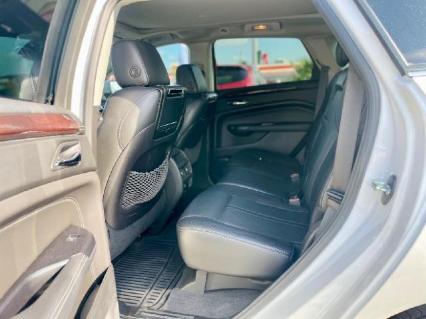 2015 Platinum Ice Tricoat /Ebony/Ebony Accents Cadillac SRX Luxury Collection FWD (3GYFNBE32FS) with an 3.6L V6 DOHC 24V FFV engine, 6-Speed Automatic transmission, located at 4545 Spencer Hwy., Pasadena, 77504, (832) 266-1645, 29.666037, -95.173775 - Photo#16