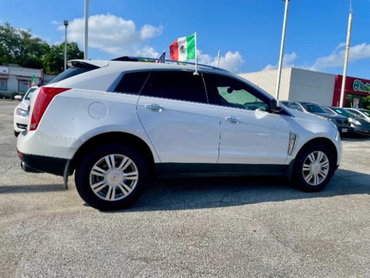 2015 Platinum Ice Tricoat /Ebony/Ebony Accents Cadillac SRX Luxury Collection FWD (3GYFNBE32FS) with an 3.6L V6 DOHC 24V FFV engine, 6-Speed Automatic transmission, located at 4545 Spencer Hwy., Pasadena, 77504, (832) 266-1645, 29.666037, -95.173775 - Photo#2
