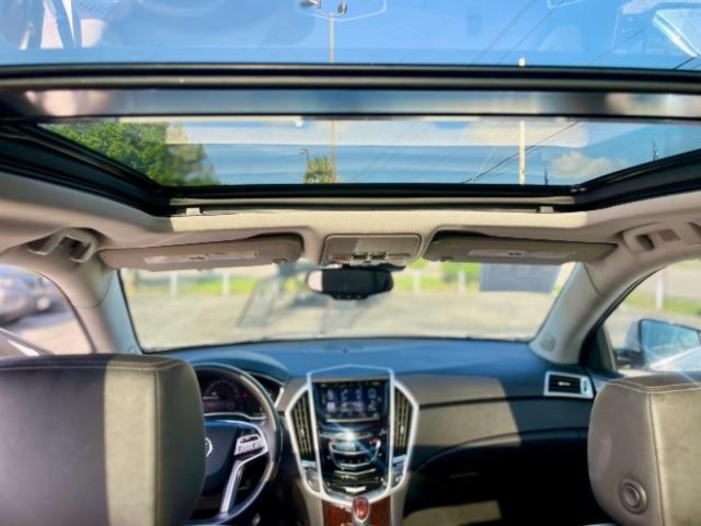 2015 Platinum Ice Tricoat /Ebony/Ebony Accents Cadillac SRX Luxury Collection FWD (3GYFNBE32FS) with an 3.6L V6 DOHC 24V FFV engine, 6-Speed Automatic transmission, located at 4545 Spencer Hwy., Pasadena, 77504, (832) 266-1645, 29.666037, -95.173775 - Photo#6