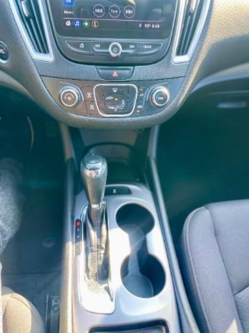 2019 Summit White /Jet Black, premium cloth Chevrolet Malibu LS (1G1ZB5ST9KF) with an 1.5L L4 DOHC 16V engine, 6-Speed Automatic transmission, located at 4545 Spencer Hwy., Pasadena, 77504, (832) 266-1645, 29.666037, -95.173775 - Photo#10