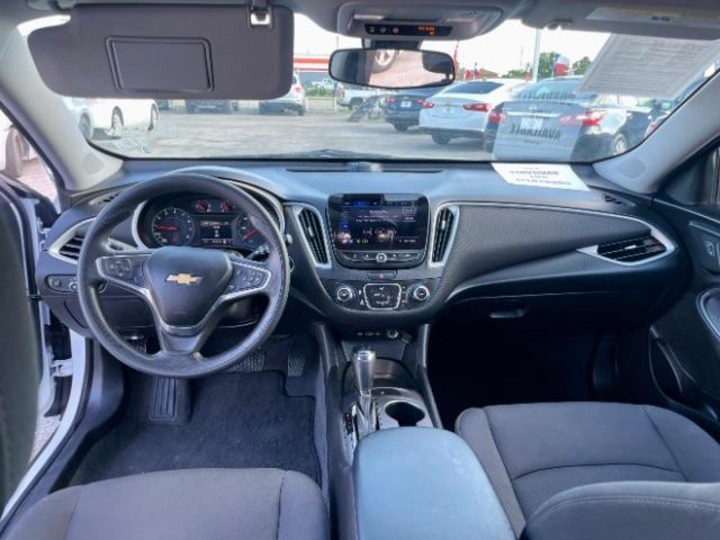 2019 Summit White /Jet Black, premium cloth Chevrolet Malibu LS (1G1ZB5ST9KF) with an 1.5L L4 DOHC 16V engine, 6-Speed Automatic transmission, located at 4545 Spencer Hwy., Pasadena, 77504, (832) 266-1645, 29.666037, -95.173775 - Photo#4