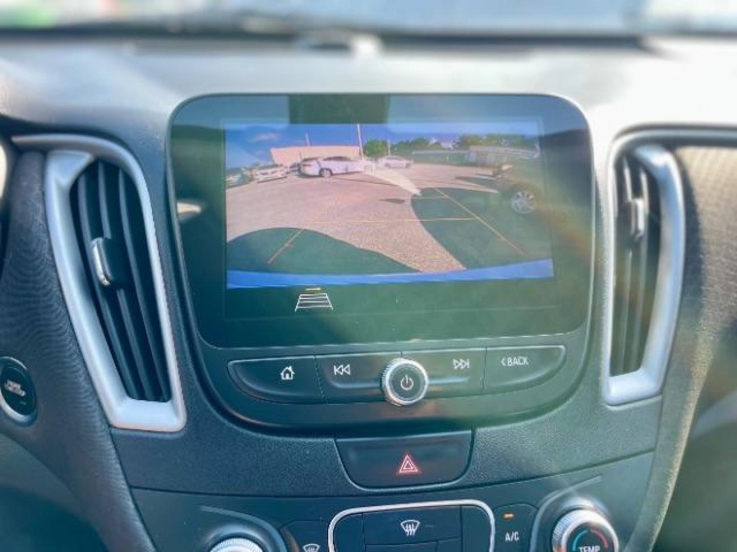 2019 Summit White /Jet Black, premium cloth Chevrolet Malibu LS (1G1ZB5ST9KF) with an 1.5L L4 DOHC 16V engine, 6-Speed Automatic transmission, located at 4545 Spencer Hwy., Pasadena, 77504, (832) 266-1645, 29.666037, -95.173775 - Photo#8