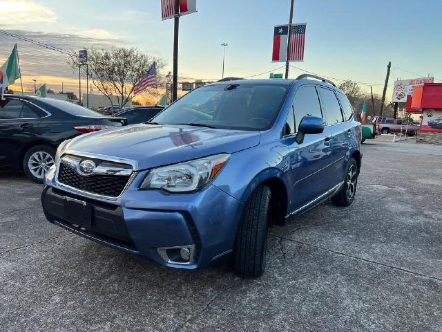2015 Quartz Blue Pearl Subaru Forester 2.0XT Touring (JF2SJGWC3FH) with an 2.0L H4 SOHC 16V engine, Continuously Variable Transmission transmission, located at 7935 Gulf Freeway, Houston, 77017, (832) 266-1645, 29.684393, -95.275665 - Photo#2