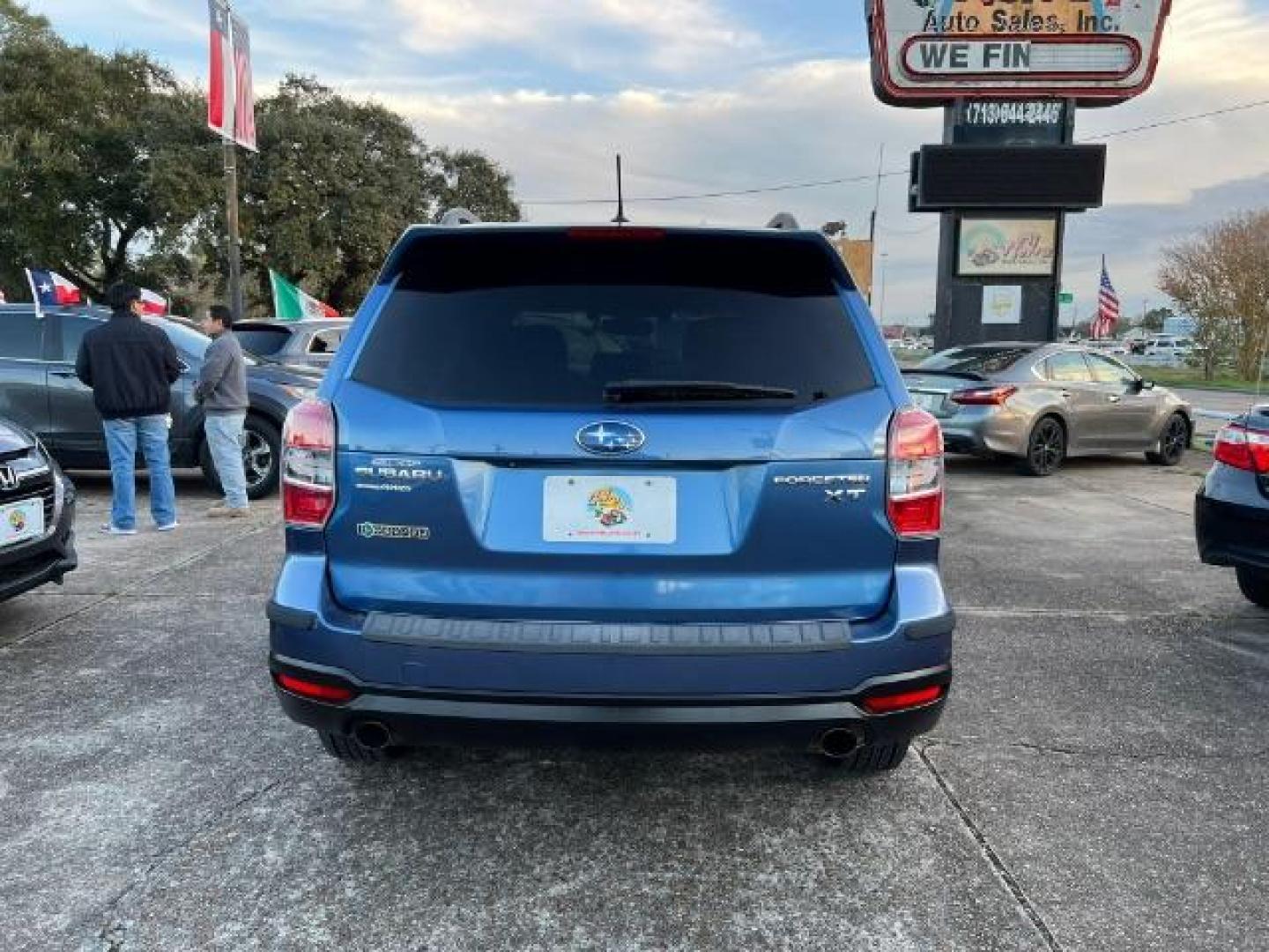 2015 Quartz Blue Pearl Subaru Forester 2.0XT Touring (JF2SJGWC3FH) with an 2.0L H4 SOHC 16V engine, Continuously Variable Transmission transmission, located at 7935 Gulf Freeway, Houston, 77017, (832) 266-1645, 29.684393, -95.275665 - Photo#5