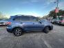 2015 Quartz Blue Pearl Subaru Forester 2.0XT Touring (JF2SJGWC3FH) with an 2.0L H4 SOHC 16V engine, Continuously Variable Transmission transmission, located at 7935 Gulf Freeway, Houston, 77017, (832) 266-1645, 29.684393, -95.275665 - Photo#7