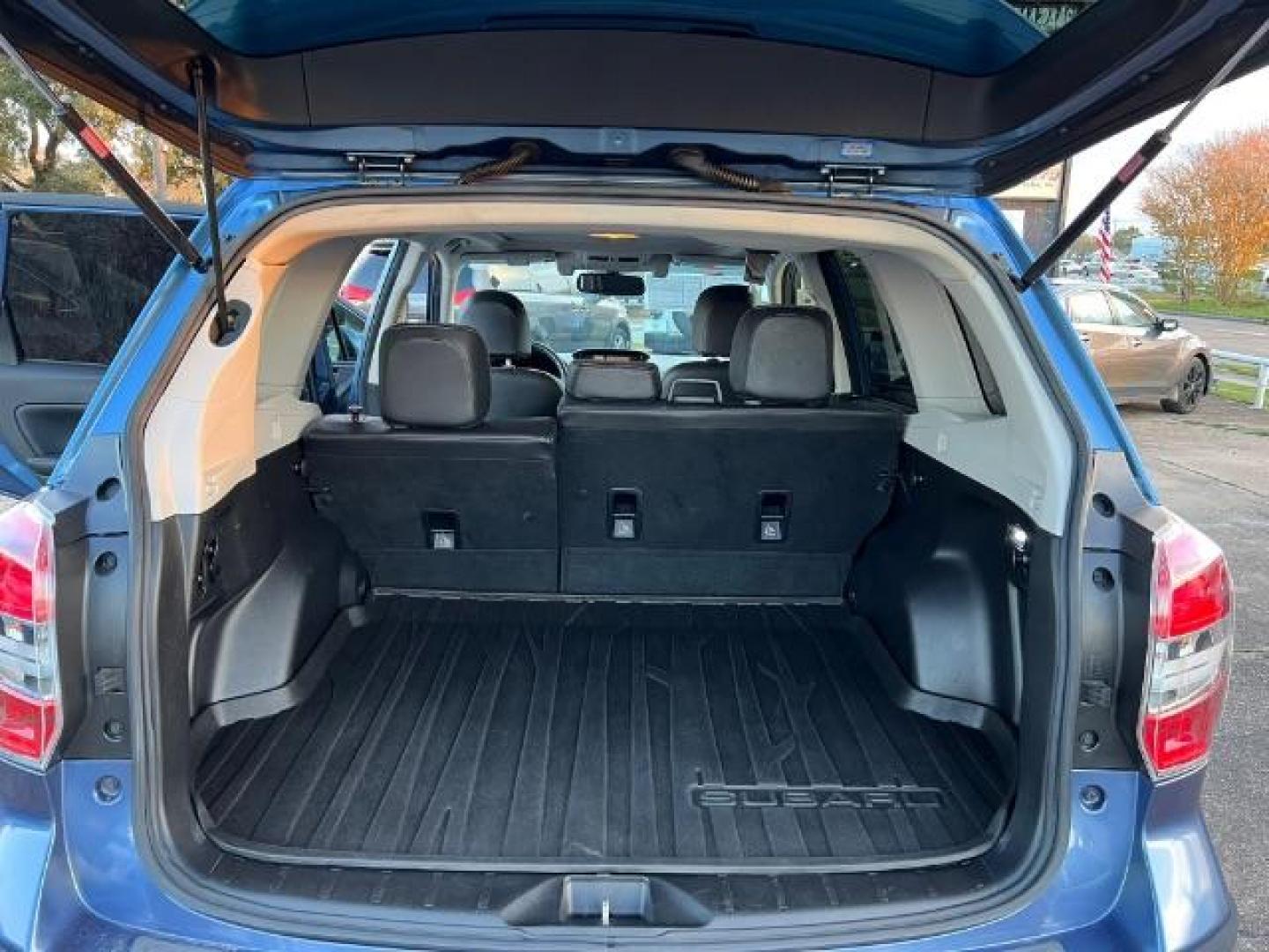 2015 Quartz Blue Pearl Subaru Forester 2.0XT Touring (JF2SJGWC3FH) with an 2.0L H4 SOHC 16V engine, Continuously Variable Transmission transmission, located at 7935 Gulf Freeway, Houston, 77017, (832) 266-1645, 29.684393, -95.275665 - Photo#13