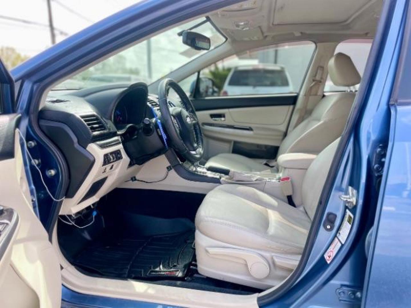 2014 Quartz Blue Pearl Subaru XV Crosstrek Hybrid 2.0i Touring (JF2GPBKC8EH) with an 2.0L L4 DOHC 16V HYBRID engine, Continuously Variable Transmission transmission, located at 4545 Spencer Hwy., Pasadena, 77504, (832) 266-1645, 29.666037, -95.173775 - Photo#9