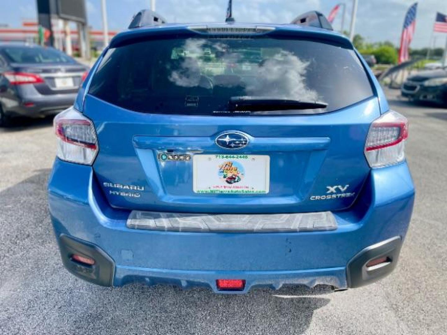 2014 Quartz Blue Pearl Subaru XV Crosstrek Hybrid 2.0i Touring (JF2GPBKC8EH) with an 2.0L L4 DOHC 16V HYBRID engine, Continuously Variable Transmission transmission, located at 4545 Spencer Hwy., Pasadena, 77504, (832) 266-1645, 29.666037, -95.173775 - Photo#3