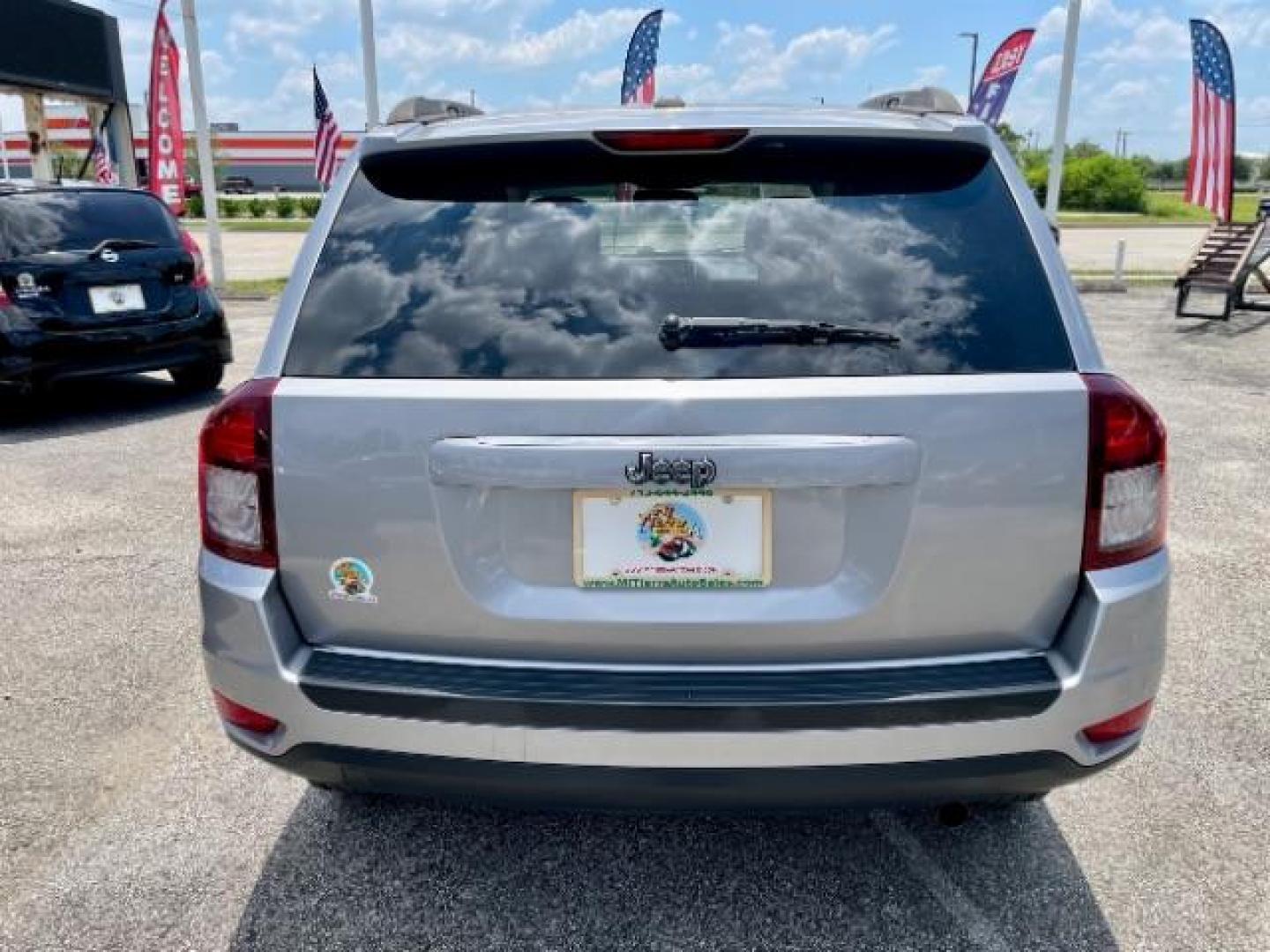 2016 Silver /Black Jeep Compass Sport FWD (1C4NJCBAXGD) with an 2.0L L4 DOHC 16V engine, located at 4545 Spencer Hwy., Pasadena, 77504, (832) 266-1645, 29.666037, -95.173775 - Photo#2