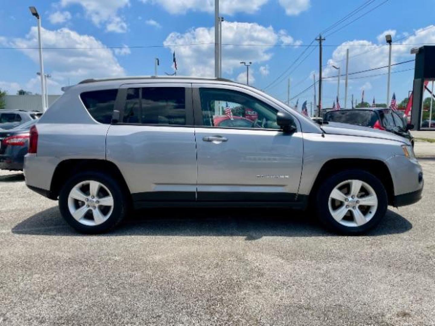 2016 Silver /Black Jeep Compass Sport FWD (1C4NJCBAXGD) with an 2.0L L4 DOHC 16V engine, located at 4545 Spencer Hwy., Pasadena, 77504, (832) 266-1645, 29.666037, -95.173775 - Photo#3