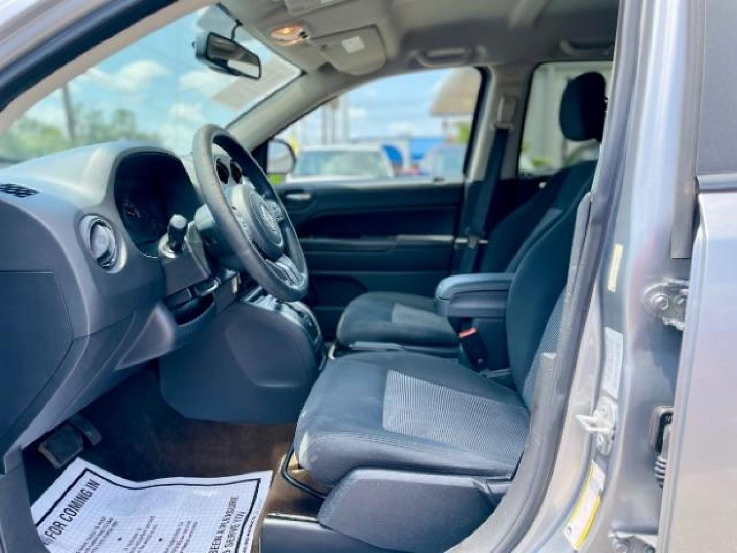 2016 Silver /Black Jeep Compass Sport FWD (1C4NJCBAXGD) with an 2.0L L4 DOHC 16V engine, located at 4545 Spencer Hwy., Pasadena, 77504, (832) 266-1645, 29.666037, -95.173775 - Photo#6