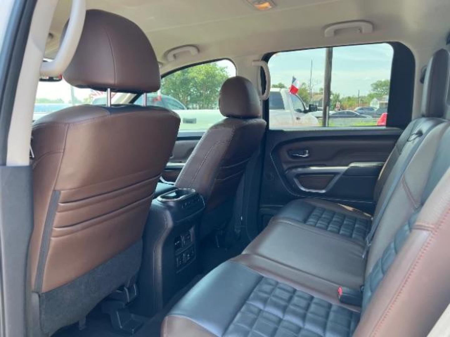 2017 Glacier White Nissan Titan Platinum Reserve Crew Cab 2WD (1N6AA1E6XHN) with an 5.6L V8 DOHC 32V engine, 6-Speed Automatic transmission, located at 7935 Gulf Freeway, Houston, 77017, (832) 266-1645, 29.684393, -95.275665 - Photo#9