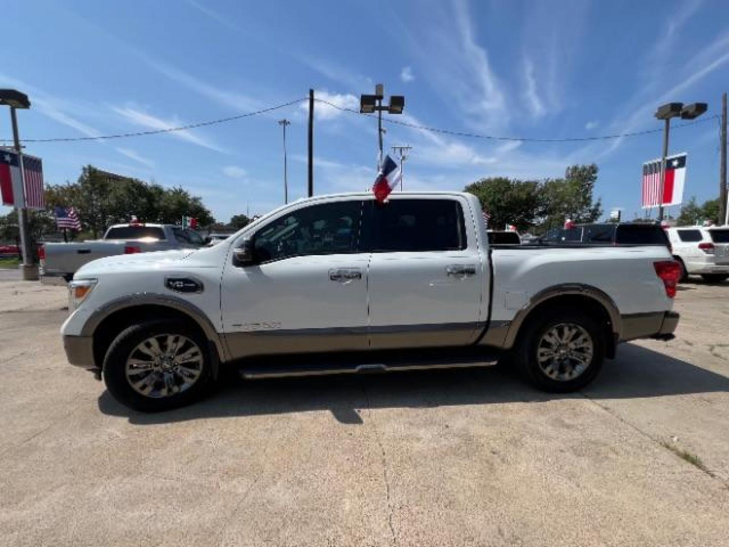 2017 Glacier White Nissan Titan Platinum Reserve Crew Cab 2WD (1N6AA1E6XHN) with an 5.6L V8 DOHC 32V engine, 6-Speed Automatic transmission, located at 7935 Gulf Freeway, Houston, 77017, (832) 266-1645, 29.684393, -95.275665 - Photo#3