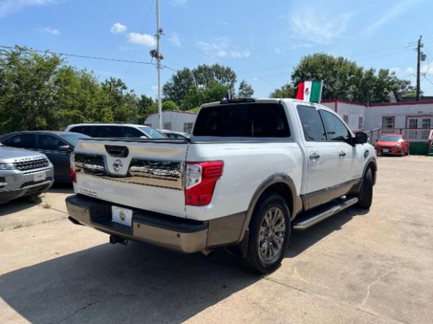 2017 Glacier White Nissan Titan Platinum Reserve Crew Cab 2WD (1N6AA1E6XHN) with an 5.6L V8 DOHC 32V engine, 6-Speed Automatic transmission, located at 7935 Gulf Freeway, Houston, 77017, (832) 266-1645, 29.684393, -95.275665 - Photo#6