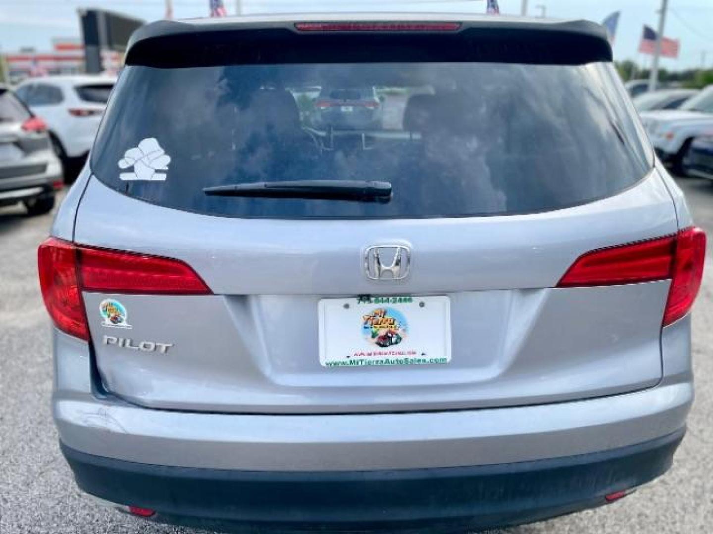 2017 Lunar Silver Metallic Honda Pilot LX 2WD (5FNYF5H14HB) with an 3.5L V6 SOHC 24V engine, 6-Speed Automatic transmission, located at 4545 Spencer Hwy., Pasadena, 77504, (832) 266-1645, 29.666037, -95.173775 - Photo#3