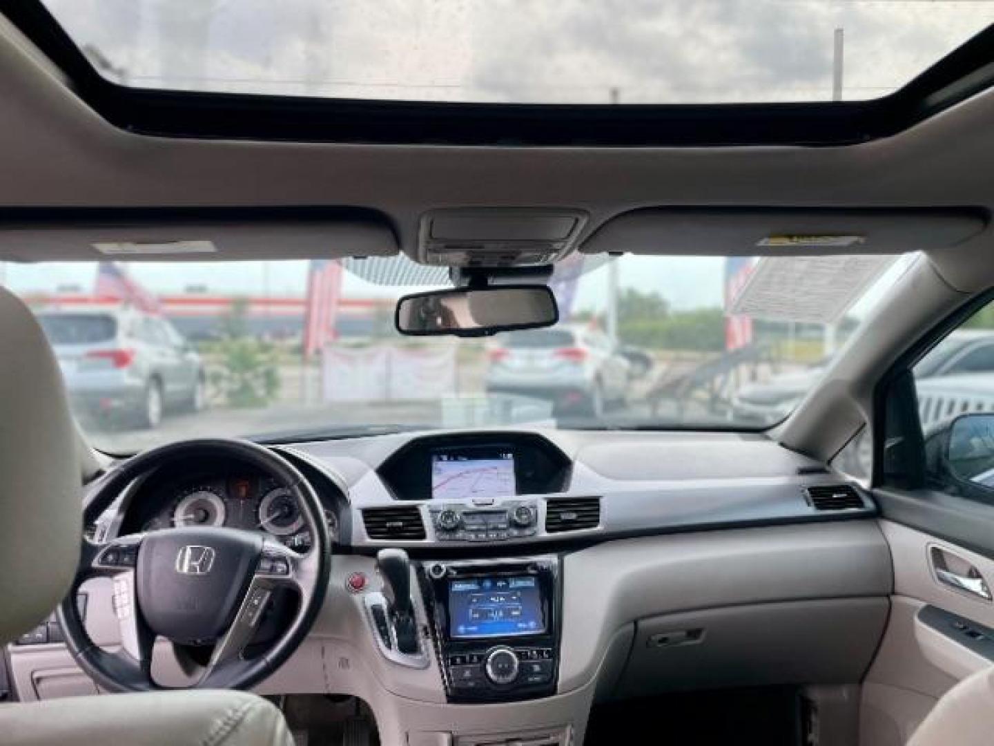 2015 Modern Steel Metallic Honda Odyssey Touring (5FNRL5H99FB) with an 3.5L V6 SOHC 24V engine, 6-Speed Automatic transmission, located at 4545 Spencer Hwy., Pasadena, 77504, (832) 266-1645, 29.666037, -95.173775 - Photo#16