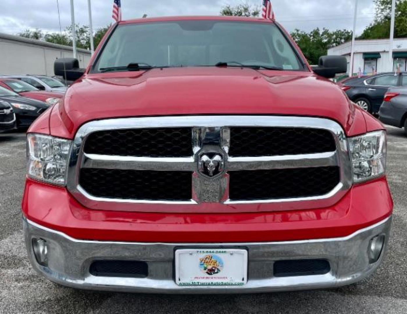 2017 Flame Red Clear Coat /Black/Diesel Gray, cloth RAM 1500 SLT Crew Cab SWB 4WD (1C6RR7LG4HS) with an 3.6L V6 DOHC 24V FFV engine, 8-Speed Automatic transmission, located at 4545 Spencer Hwy., Pasadena, 77504, (832) 266-1645, 29.666037, -95.173775 - Photo#0