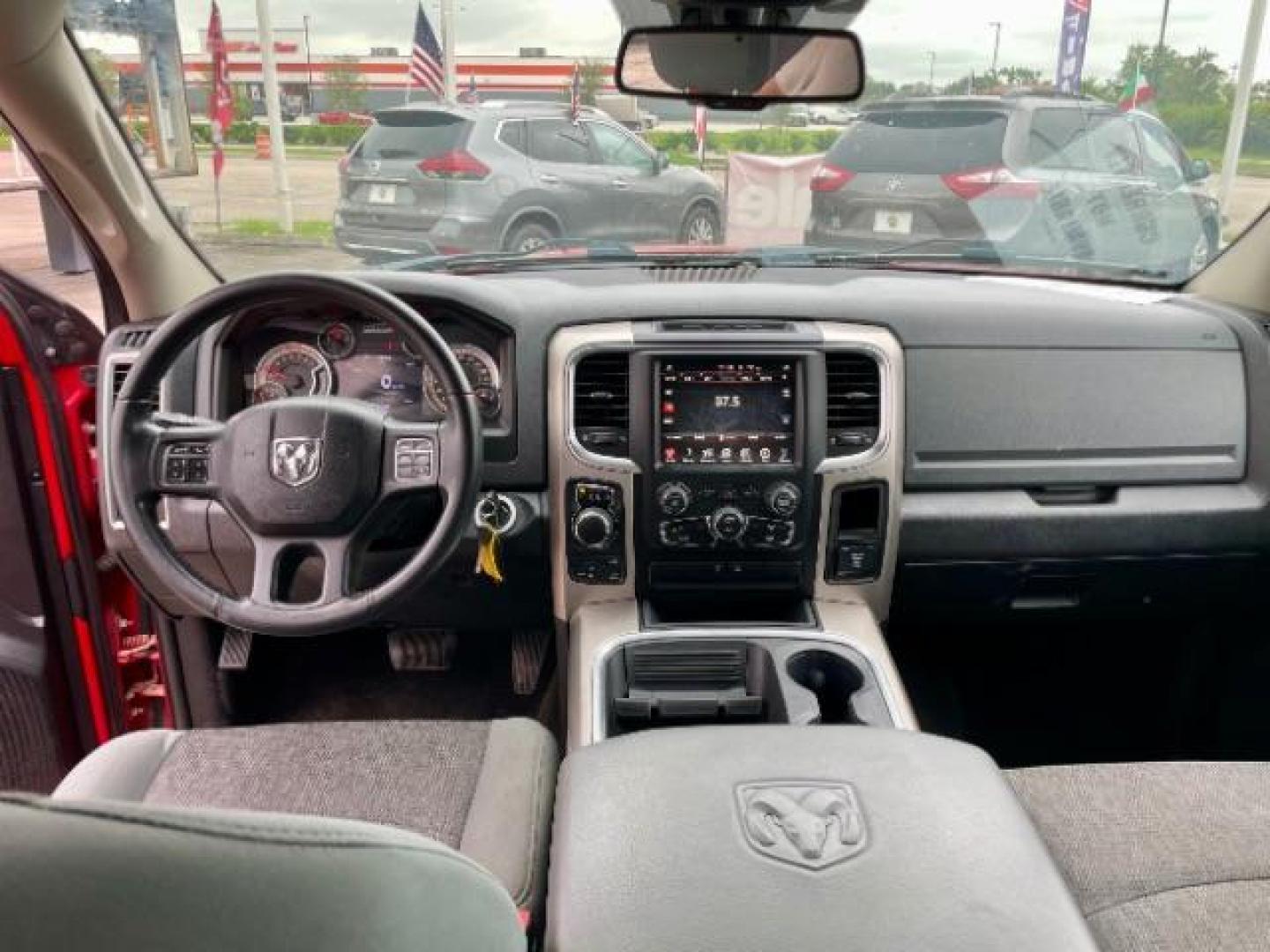 2017 Flame Red Clear Coat /Black/Diesel Gray, cloth RAM 1500 SLT Crew Cab SWB 4WD (1C6RR7LG4HS) with an 3.6L V6 DOHC 24V FFV engine, 8-Speed Automatic transmission, located at 4545 Spencer Hwy., Pasadena, 77504, (832) 266-1645, 29.666037, -95.173775 - Photo#5