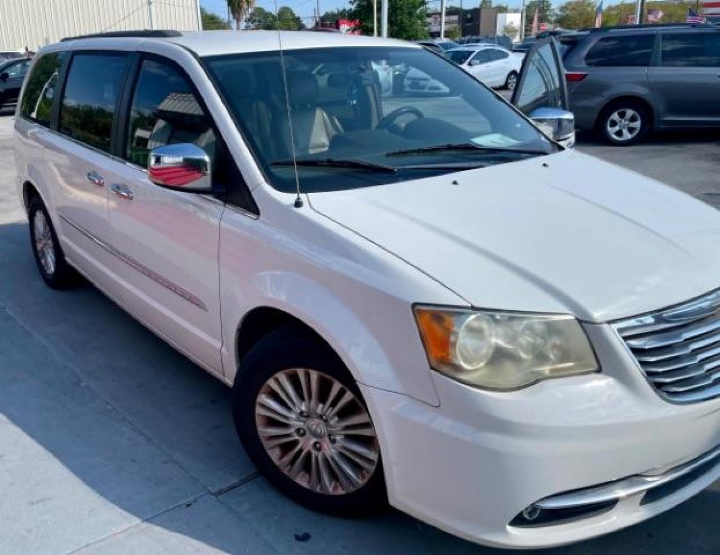 2011 Stone White /Dark Frost Beige/Med Chrysler Town and Country Touring-L (2A4RR8DG8BR) with an 3.6L V6 DOHC 24V engine, 6-Speed Automatic transmission, located at 4545 Spencer Hwy., Pasadena, 77504, (832) 266-1645, 29.666037, -95.173775 - Photo#2