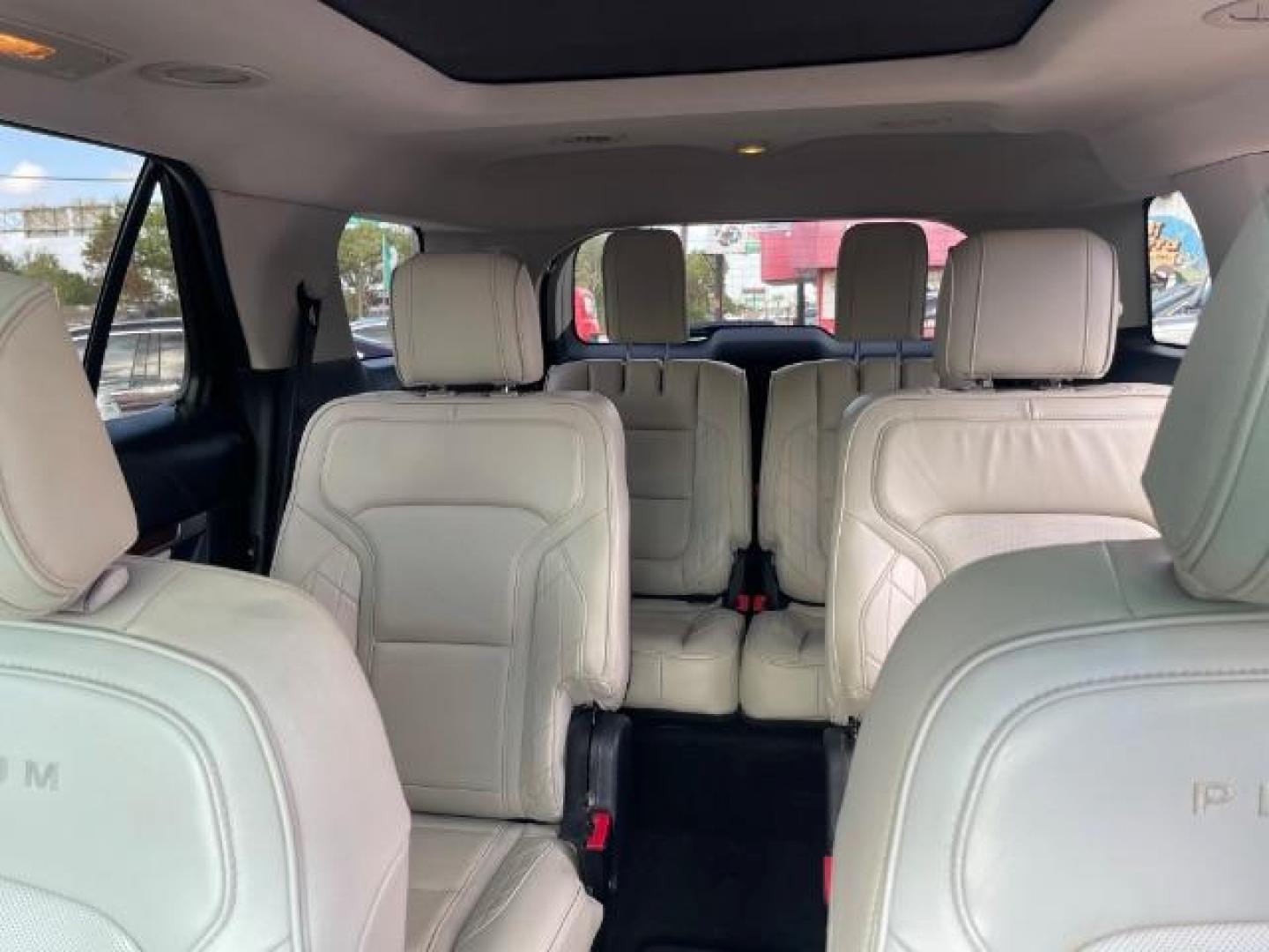 2016 Ruby Red Metallic Tinted Clearcoat Ford Explorer Platinum AWD (1FM5K8HT0GG) with an 3.5L V6 DOHC 24V engine, 6-Speed Automatic transmission, located at 7935 Gulf Freeway, Houston, 77017, (832) 266-1645, 29.684393, -95.275665 - Photo#9
