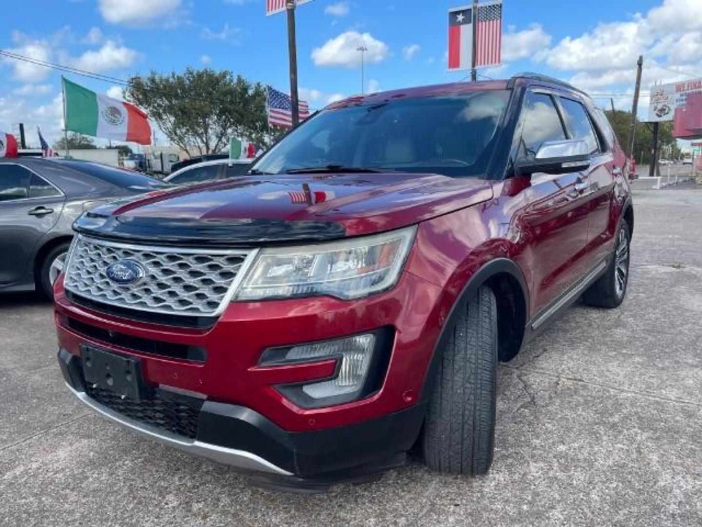 2016 Ruby Red Metallic Tinted Clearcoat Ford Explorer Platinum AWD (1FM5K8HT0GG) with an 3.5L V6 DOHC 24V engine, 6-Speed Automatic transmission, located at 7935 Gulf Freeway, Houston, 77017, (832) 266-1645, 29.684393, -95.275665 - Photo#1