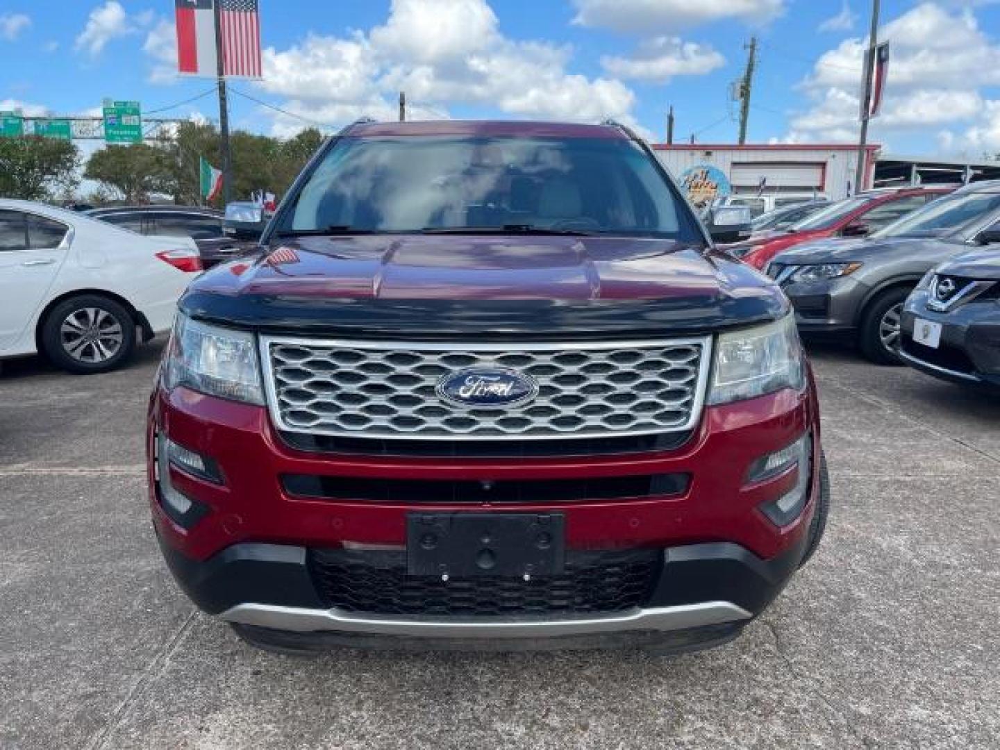 2016 Ruby Red Metallic Tinted Clearcoat Ford Explorer Platinum AWD (1FM5K8HT0GG) with an 3.5L V6 DOHC 24V engine, 6-Speed Automatic transmission, located at 7935 Gulf Freeway, Houston, 77017, (832) 266-1645, 29.684393, -95.275665 - Photo#3