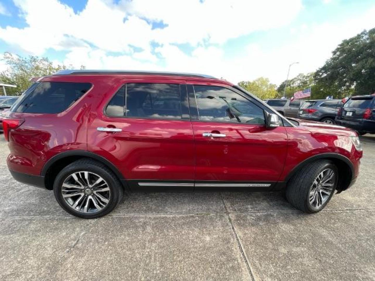 2016 Ruby Red Metallic Tinted Clearcoat Ford Explorer Platinum AWD (1FM5K8HT0GG) with an 3.5L V6 DOHC 24V engine, 6-Speed Automatic transmission, located at 7935 Gulf Freeway, Houston, 77017, (832) 266-1645, 29.684393, -95.275665 - Photo#7