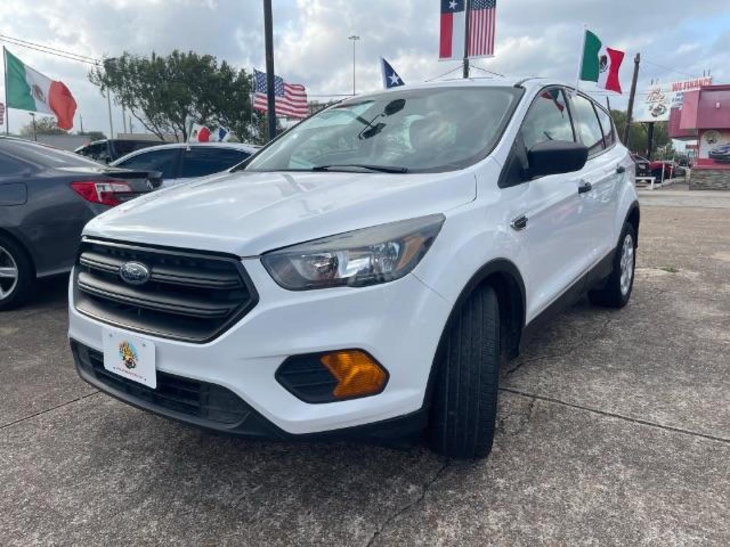 2019 Oxford White Ford Escape S FWD (1FMCU0F7XKU) with an 2.5L L4 DOHC 16V engine, 6-Speed Automatic transmission, located at 7935 Gulf Freeway, Houston, 77017, (832) 266-1645, 29.684393, -95.275665 - Photo#2