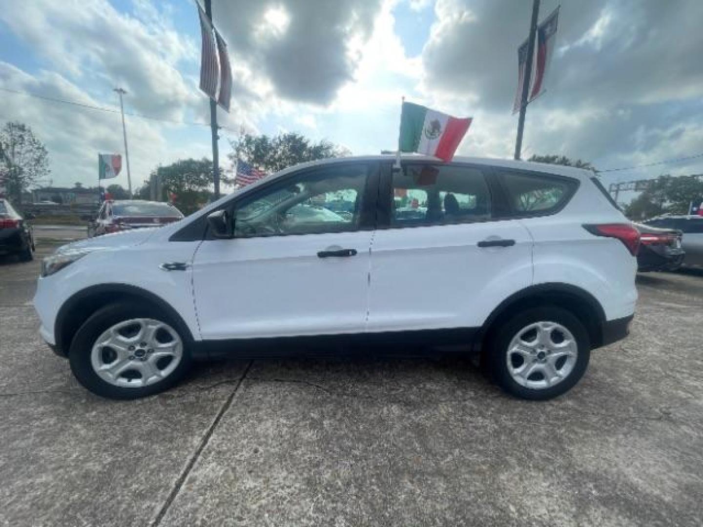 2019 Oxford White Ford Escape S FWD (1FMCU0F7XKU) with an 2.5L L4 DOHC 16V engine, 6-Speed Automatic transmission, located at 7935 Gulf Freeway, Houston, 77017, (832) 266-1645, 29.684393, -95.275665 - Photo#3