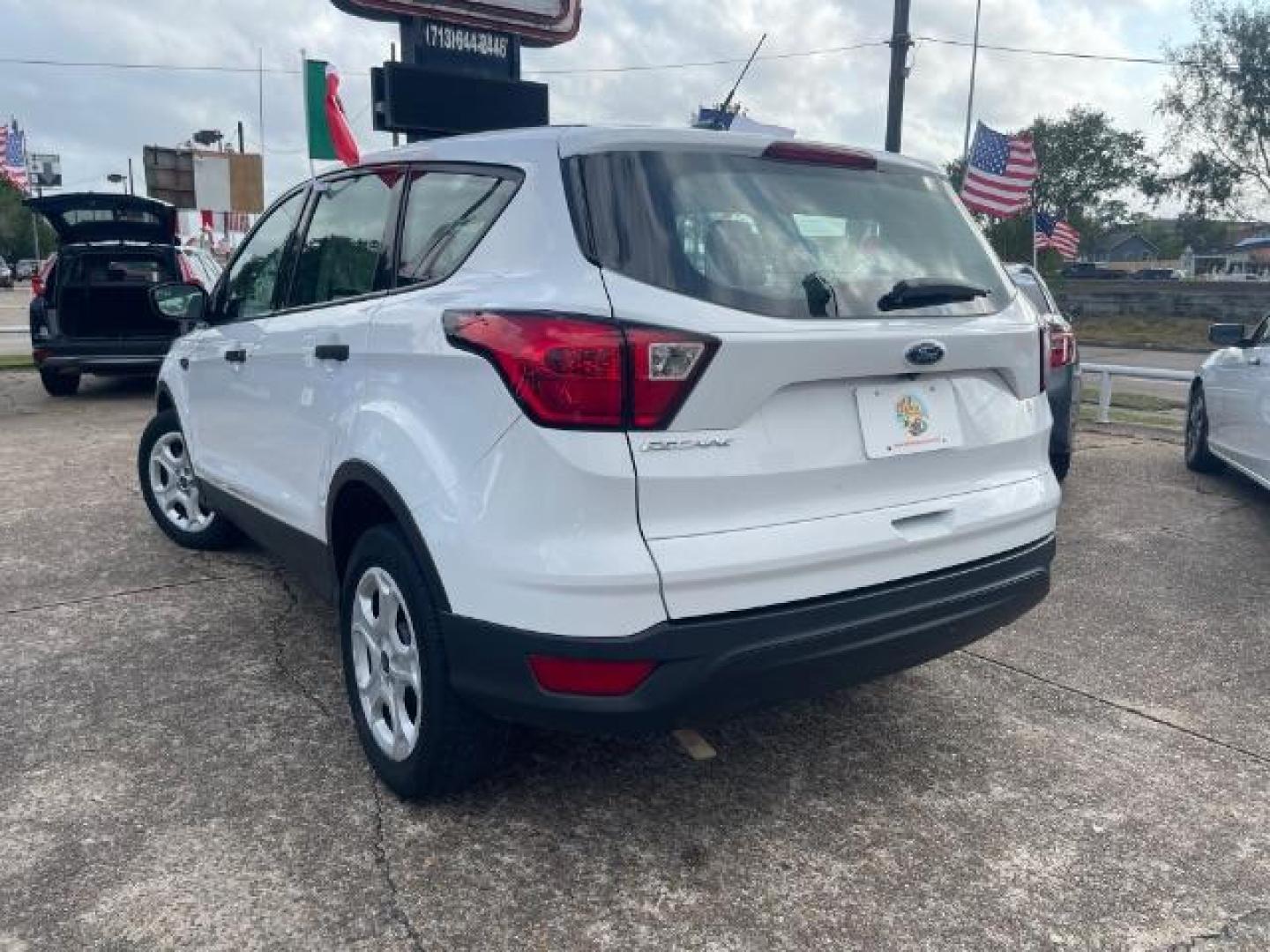 2019 Oxford White Ford Escape S FWD (1FMCU0F7XKU) with an 2.5L L4 DOHC 16V engine, 6-Speed Automatic transmission, located at 7935 Gulf Freeway, Houston, 77017, (832) 266-1645, 29.684393, -95.275665 - Photo#4
