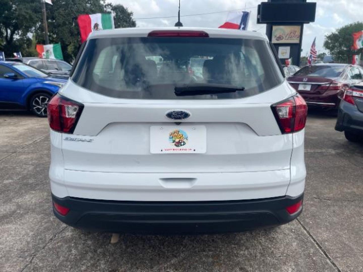 2019 Oxford White Ford Escape S FWD (1FMCU0F7XKU) with an 2.5L L4 DOHC 16V engine, 6-Speed Automatic transmission, located at 7935 Gulf Freeway, Houston, 77017, (832) 266-1645, 29.684393, -95.275665 - Photo#5