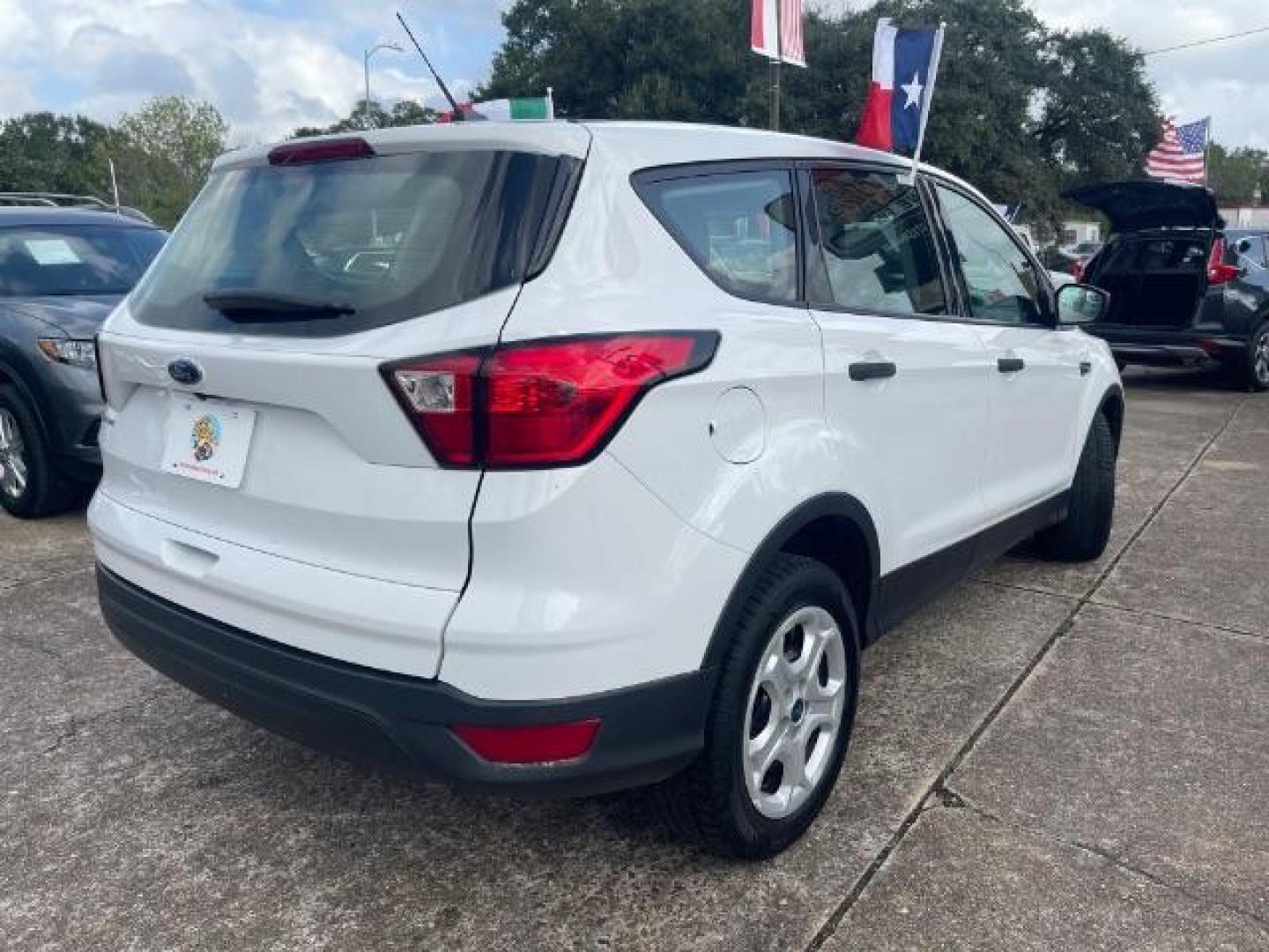 2019 Oxford White Ford Escape S FWD (1FMCU0F7XKU) with an 2.5L L4 DOHC 16V engine, 6-Speed Automatic transmission, located at 7935 Gulf Freeway, Houston, 77017, (832) 266-1645, 29.684393, -95.275665 - Photo#6