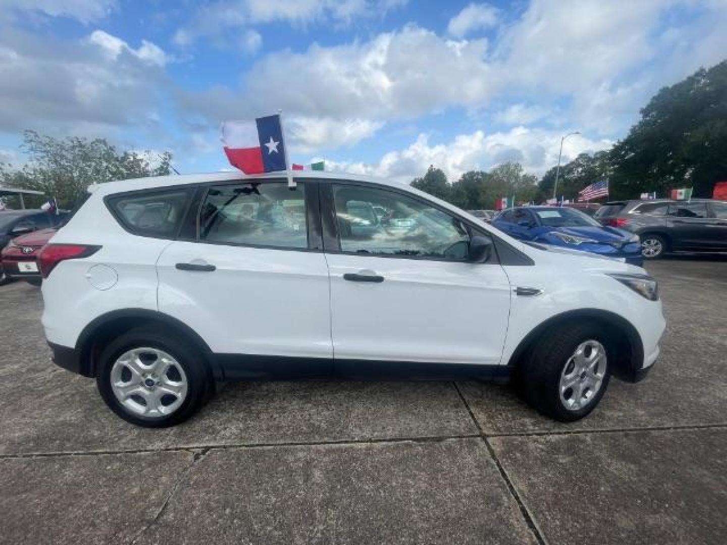 2019 Oxford White Ford Escape S FWD (1FMCU0F7XKU) with an 2.5L L4 DOHC 16V engine, 6-Speed Automatic transmission, located at 7935 Gulf Freeway, Houston, 77017, (832) 266-1645, 29.684393, -95.275665 - Photo#7