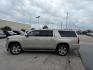 2015 CASHMERE METALLIC /brown Chevrolet Suburban LTZ 1500 4WD (1GNSKKKC4FR) with an 5.3L V8 OHV 16V engine, 6-Speed Automatic transmission, located at 4545 Spencer Hwy., Pasadena, 77504, (832) 266-1645, 29.666037, -95.173775 - Photo#0